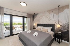 4 عدّة غرف نوم ومكواة/لوح كي وواي فاي مجانًا وملاءات أسرّة