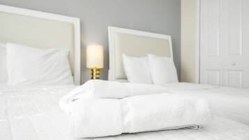 4 bedrooms, iron/ironing board, travel cot, WiFi