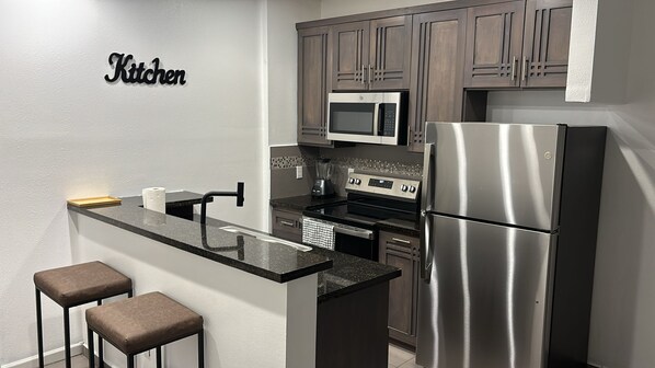 Fridge, microwave, oven, stovetop