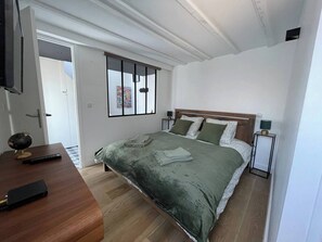 2 dormitorios, tabla de planchar con plancha, wifi y ropa de cama