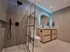 Shower, hair dryer, towels, soap