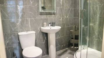 Hair dryer, towels, soap, shampoo