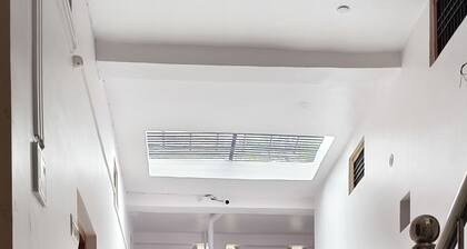 Spacious 18-Bedroom Retreat in Sacred Ayodhya, Embraced by Comfort and Serenity.