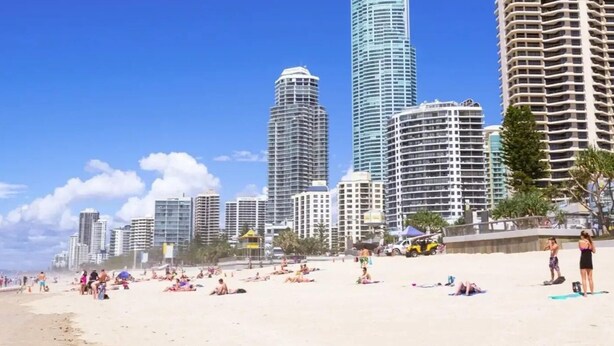 A beach with high-rise buildings in the background. - Riverside Retreat Pool, Pontoon & Space (Bundall)