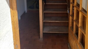 A wooden staircase with a glass door on the right. - Country house near spa  (Vandenesse)