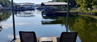 Newly Updated in a Private Cove, with Firepit, Flat Lawn, Dock, Boat Slip & Kayaks in Osage Beach