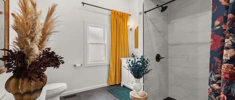 Shower, hair dryer, towels, shampoo