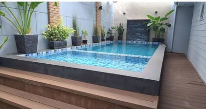 Spacious 4-bedroom house in charming Angeles City with WiFi, AC