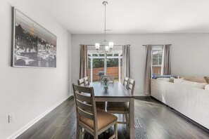 Enjoy meals in this dining area with a large table and six comfortable chairs.