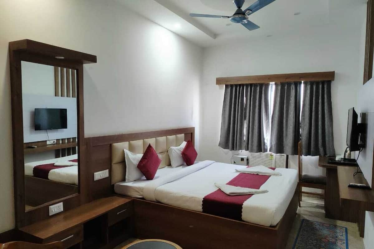 Quarto executivo | Wi-Fi de cortesia, roupa de cama