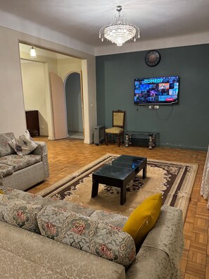 TV - Nile view apartment in garden city (Qasr El Nil)
