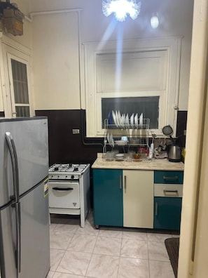 Fridge, microwave, oven, cookware/dishes/utensils - Beautiful apartment in the heart of cairo (Qasr El Nil)