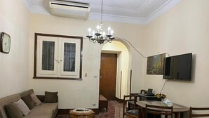 TV, fireplace - Beautiful apartment in the heart of cairo (Qasr El Nil)