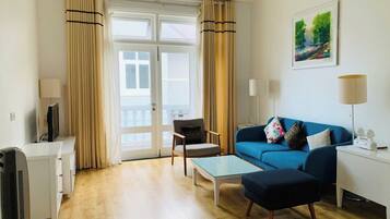 Deluxe Villa, 4 Bedrooms, Non Smoking, Courtyard View | Living area | Flat-screen TV