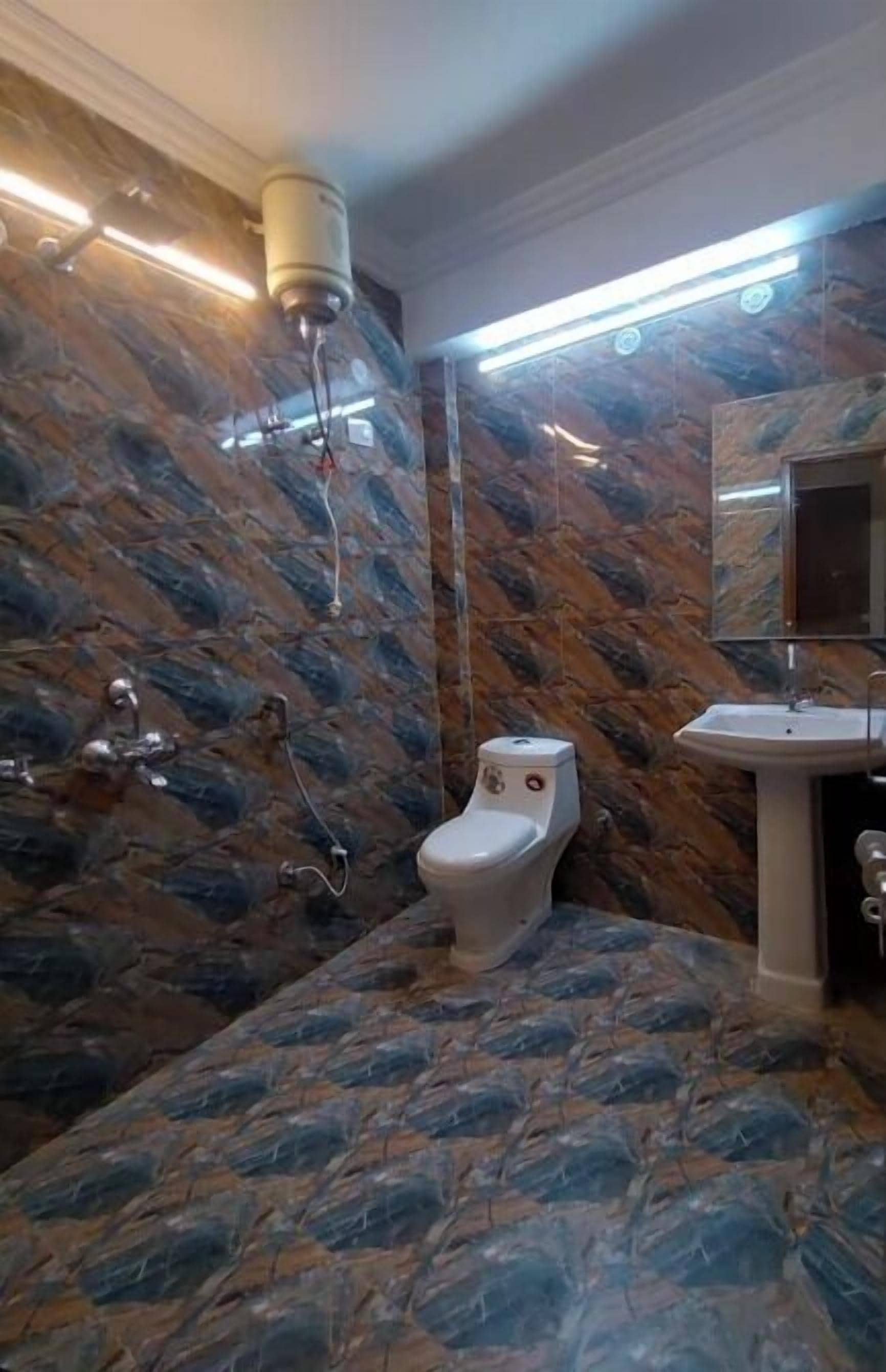 Shower, bathrobes, towels, shampoo