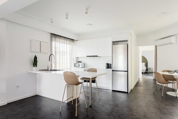 OneZeroTwo Absolute | Private kitchen | Full-size fridge, microwave, oven, stovetop