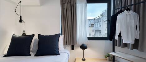 MoRe View | Desk, laptop workspace, blackout curtains, iron/ironing board