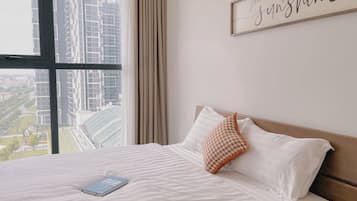 Luxury Apartment, Balcony, City View | 1 bedroom, desk, blackout curtains, iron/ironing board