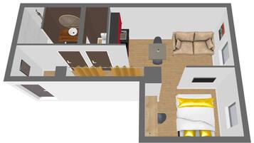 A 3D floor plan of a hotel room with a bed, a sofa, a desk, and a bathroom.