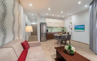 Apartamento Deluxe, vistas a la ciudad | Zona de estar