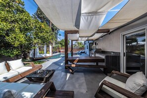 Outdoor dining - Luxury 3BR Oasis: Pool & Style (Costa Mesa)
