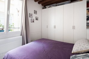 1 bedroom, desk, iron/ironing board, travel cot