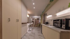 Apartment, Balcony | Private kitchen - Koukaki Luxury Suites (Athens)