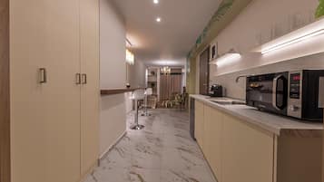 Apartamento, sacada | Cozinha privada