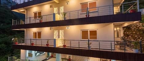 Deluxe Double Room, Mountain View | Front of property - evening/night