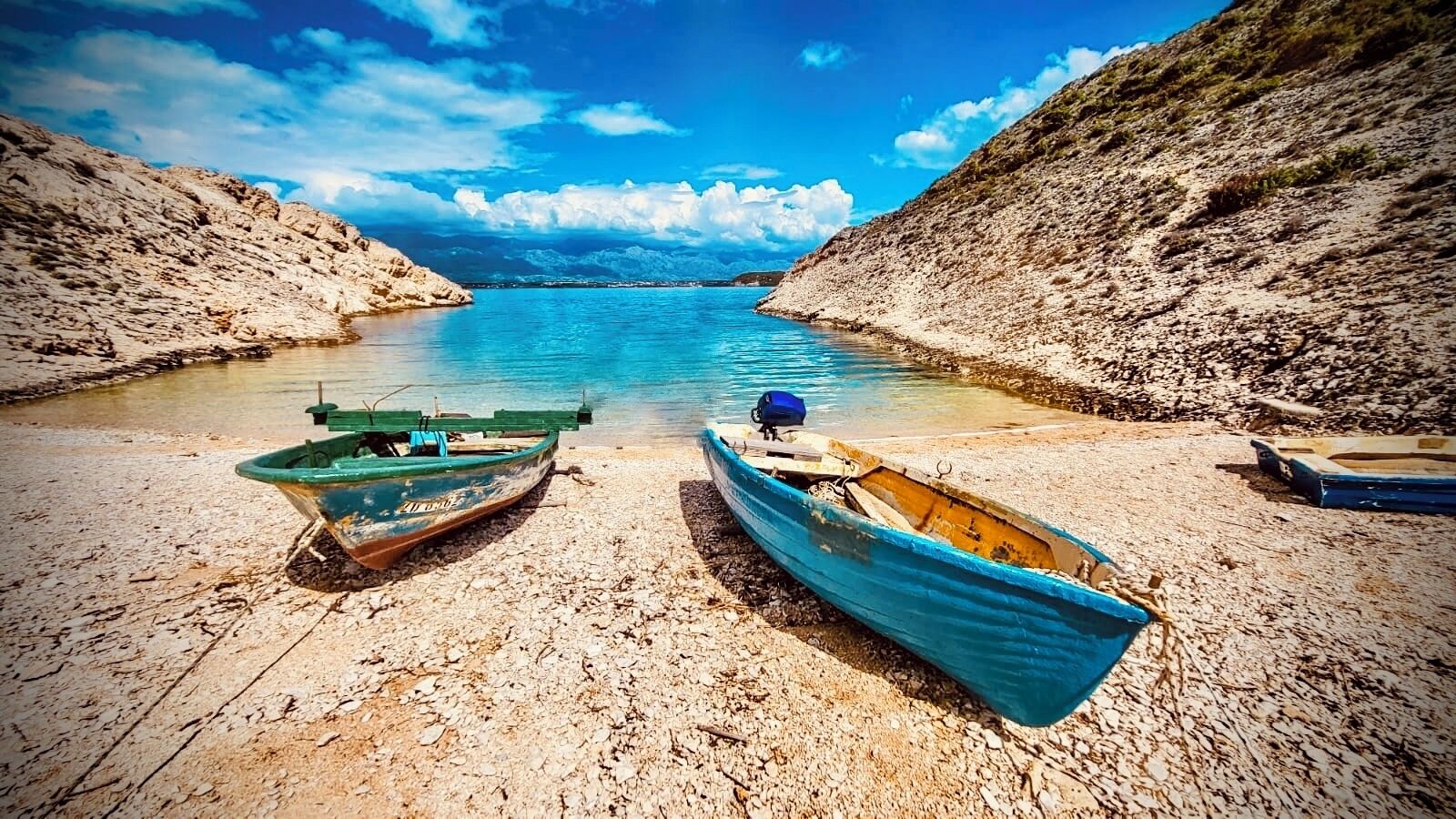 On the beach, sun-loungers