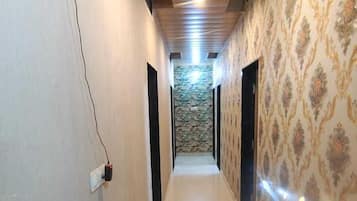 Family Room, 1 Large Single Bed | Living area | Fireplace, heated floors