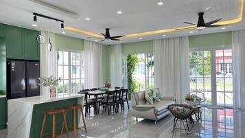 Family Villa, 3 Bedrooms, Garden View | Living area | 55-inch Smart TV with satellite channels, books, smart speakers