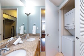 Shower, hair dryer, towels, shampoo