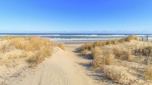 A sandy beach path leading to the ocean with dunes and grasses. - Ocean Views, Gorgeous! Dogs Welcome, Hot Tub, SN9805 (Nags Head)