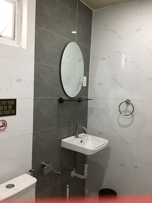 Shower, bidet, towels, soap