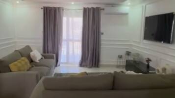 Apartment, 2 Bedrooms, Smoking, Balcony | Living area