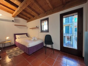 Duplex, Non Smoking, Courtyard View | 2 bedrooms, blackout drapes, iron/ironing board, free WiFi