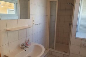 Douche, sèche-cheveux