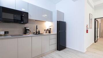 Comfort Apartment | Private kitchen | Fridge, microwave, stovetop, coffee/tea maker