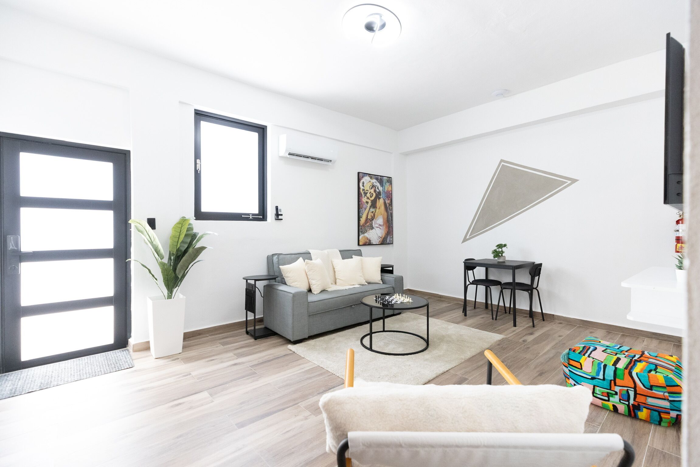 Deluxe Apartment | Living area | 40-inch Smart TV with digital channels