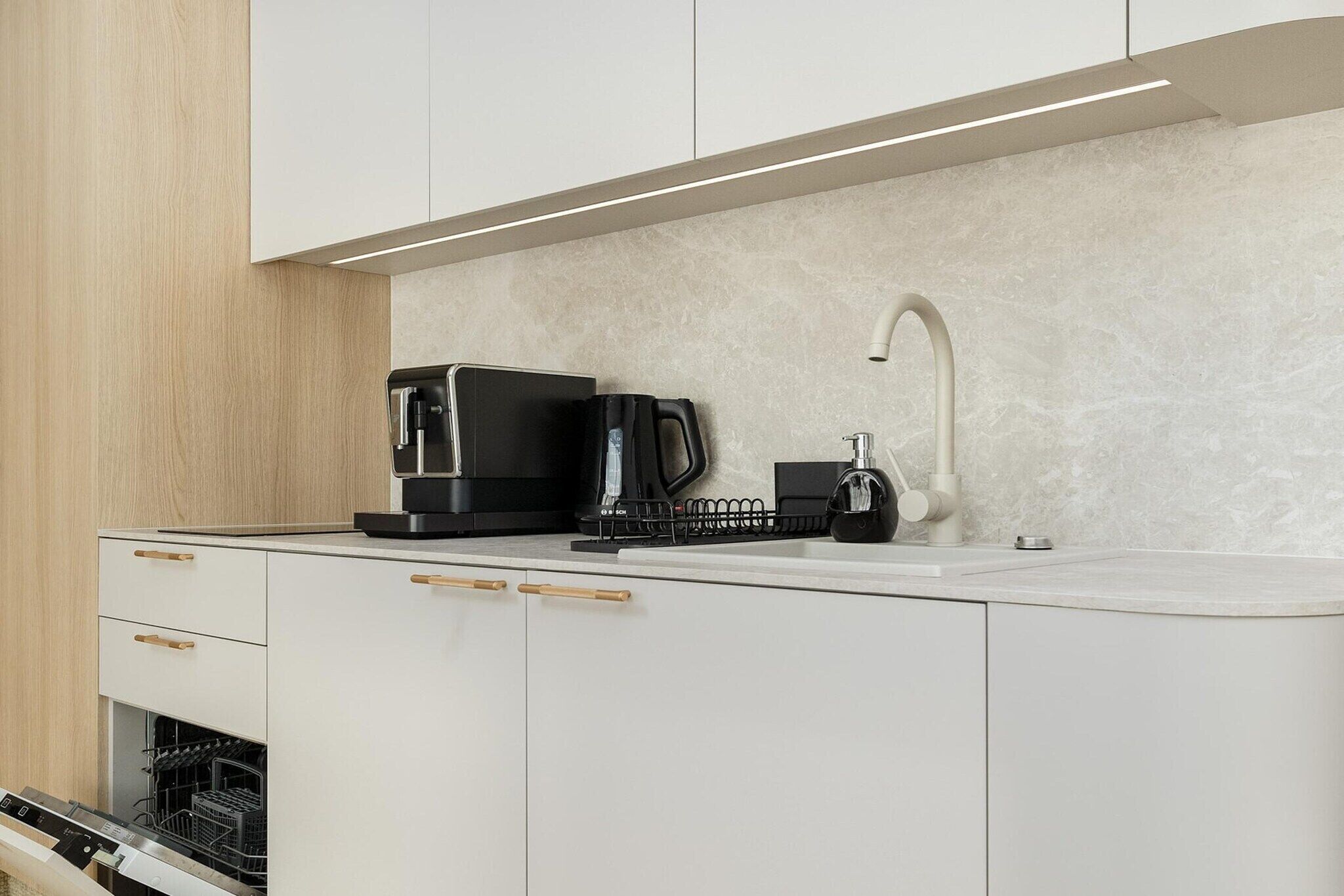 Coffee/tea maker, fridge, stovetop, dishwasher
