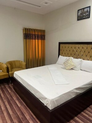 Deluxe Double Room, Mountain View | Soundproofing, iron/ironing board, free WiFi - Hotel Visit Inn  (Abbottabad)