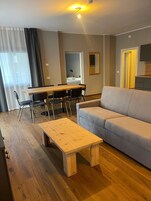 Quadrilocale Luxury con grande terrazza | Living area | TV, heated floors