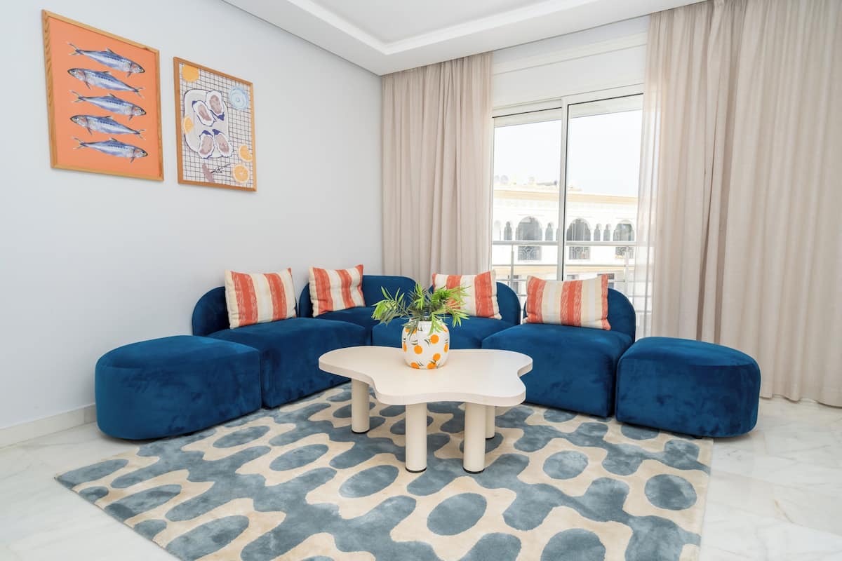 Apartment, 2 Bedrooms, Sea View | Living area | 50-inch Smart TV with satellite channels