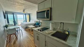 Fridge, microwave, stovetop, coffee/tea maker