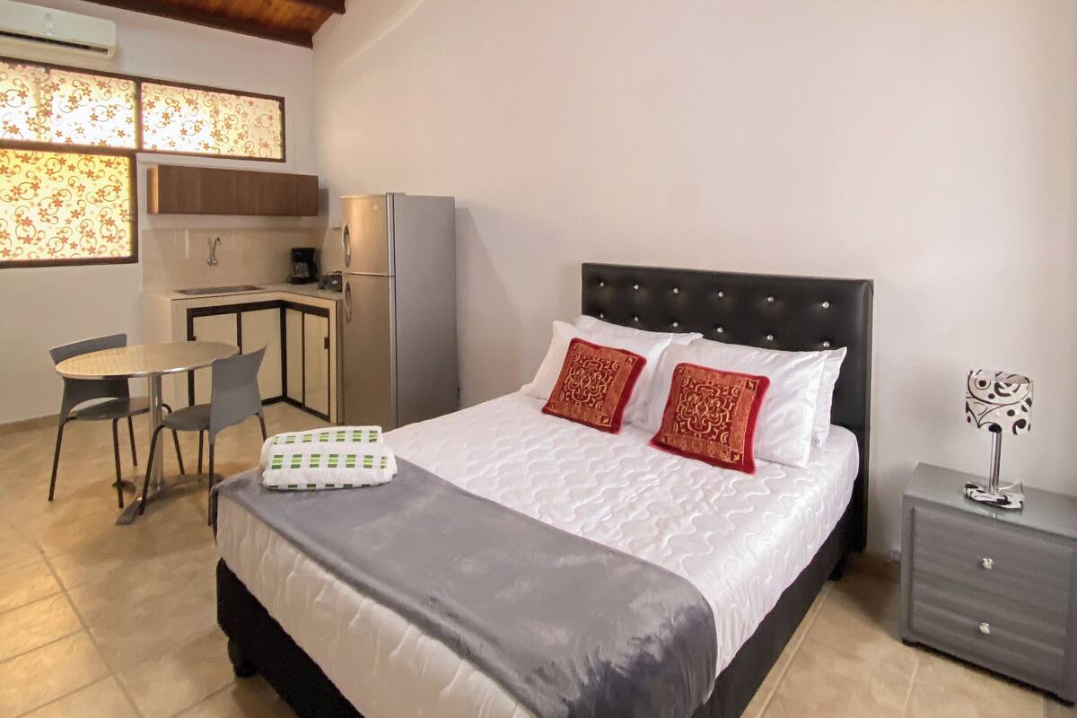 Family Studio, Private Bathroom | Blackout drapes, bed sheets