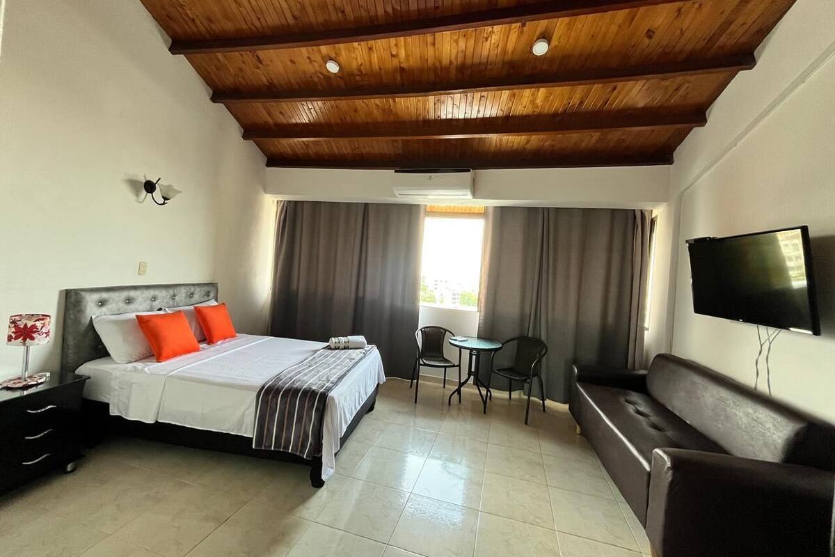 Deluxe Room, Private Bathroom, City View | Blackout drapes, bed sheets