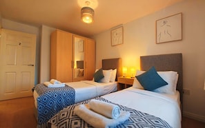 4 bedrooms, desk, iron/ironing board, travel cot
