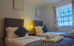 4 bedrooms, desk, iron/ironing board, travel crib