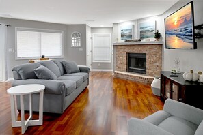 Smart TV, fireplace, books